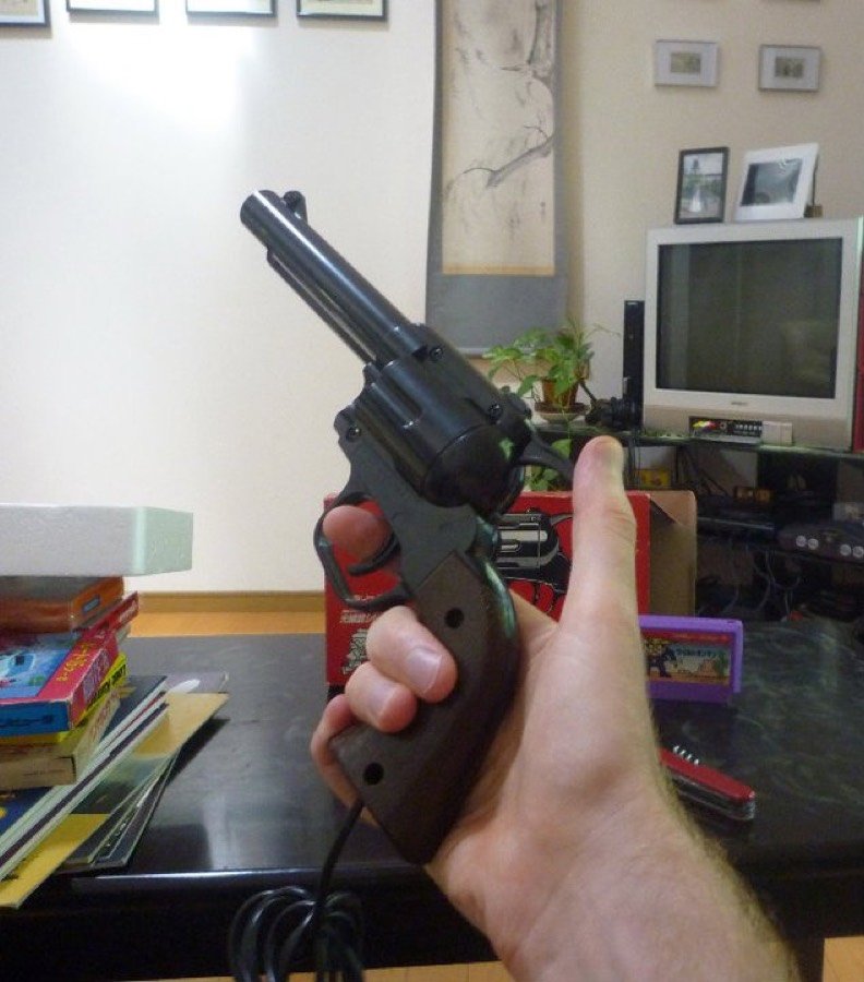 The Famicom Ray Gun revolver held in hand