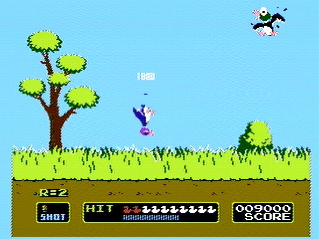 Duck Hunt: a duck you shot falls, showing 1000 points, while another flies away
