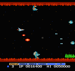 Gradius: the Vic Viper fires through a red cavern while enemy ships swarm in