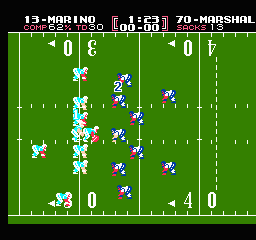Tecmo Bowl: an overhead view of a football play with a Marino versus Marshall score bar, the clock and sacks at the top